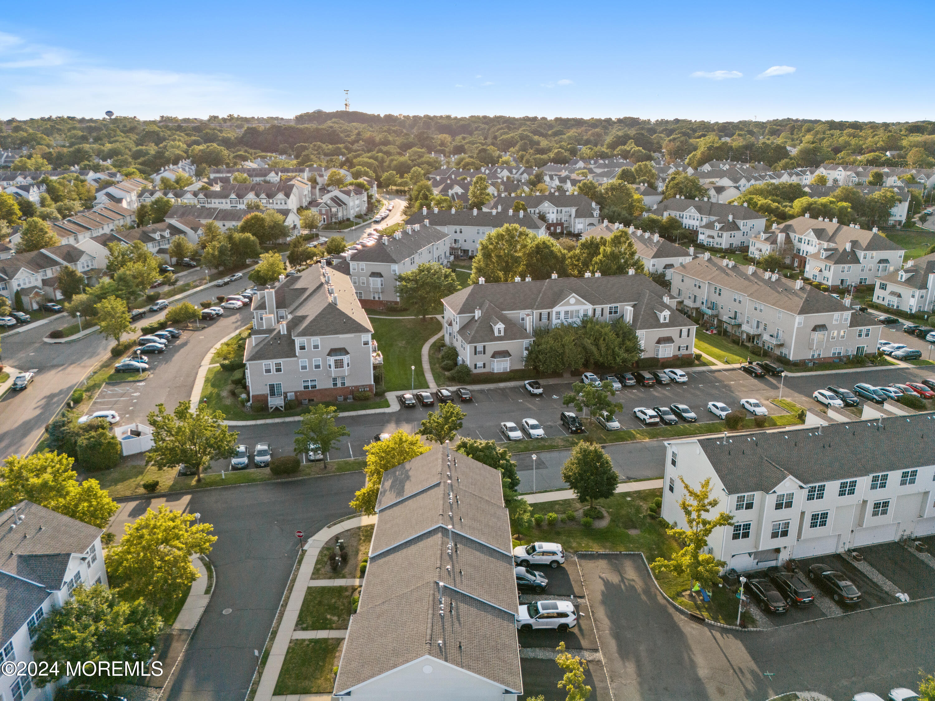 5 Kuczynski Drive, Unit 945 Parlin, NJ 08859 - Photo 51 of 62 an aerial view of residential houses with outdoor space