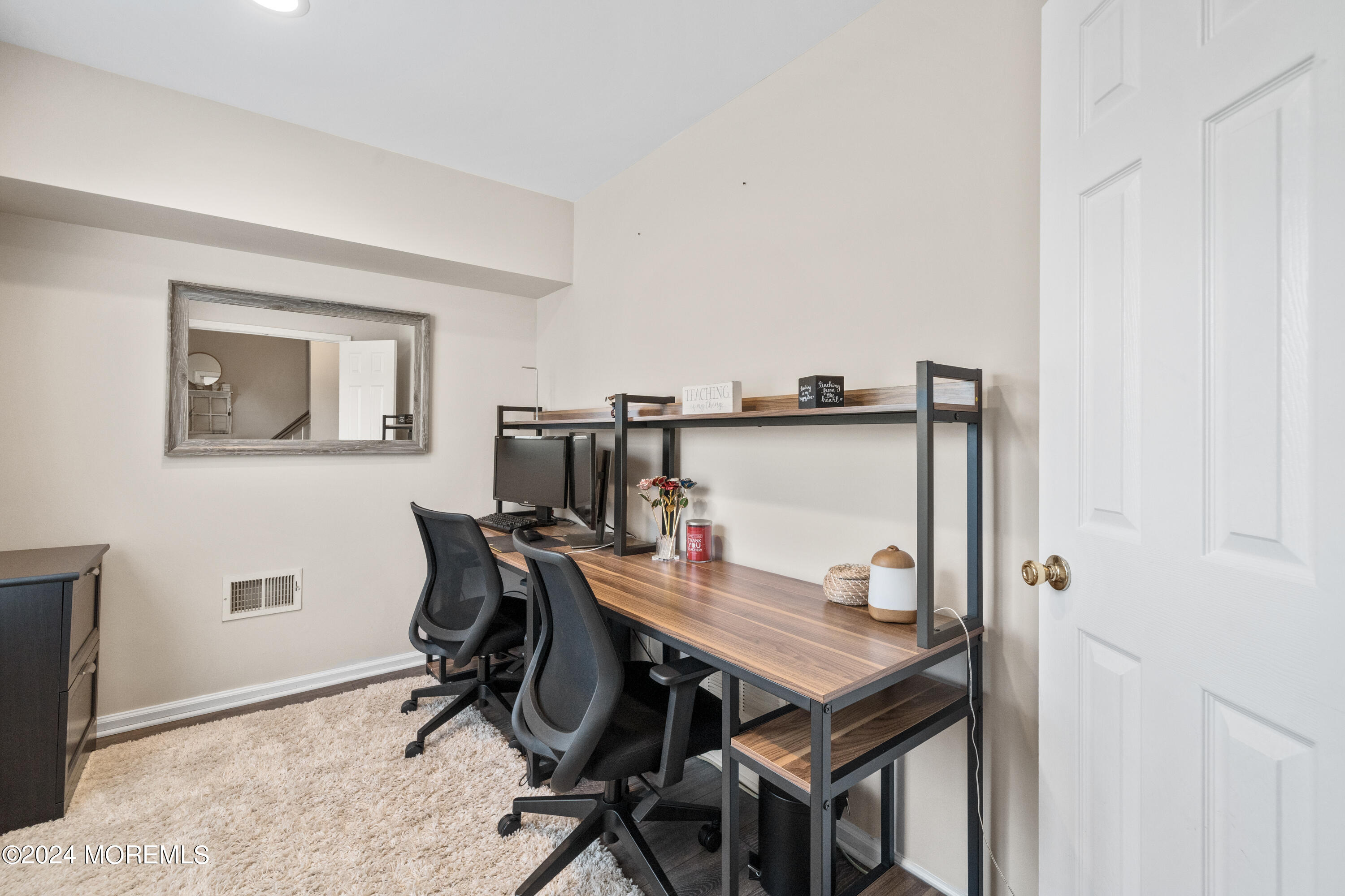 5 Kuczynski Drive, Unit 945 Parlin, NJ 08859 - Photo 6 of 62 a view of a dining room with furniture and wooden floor