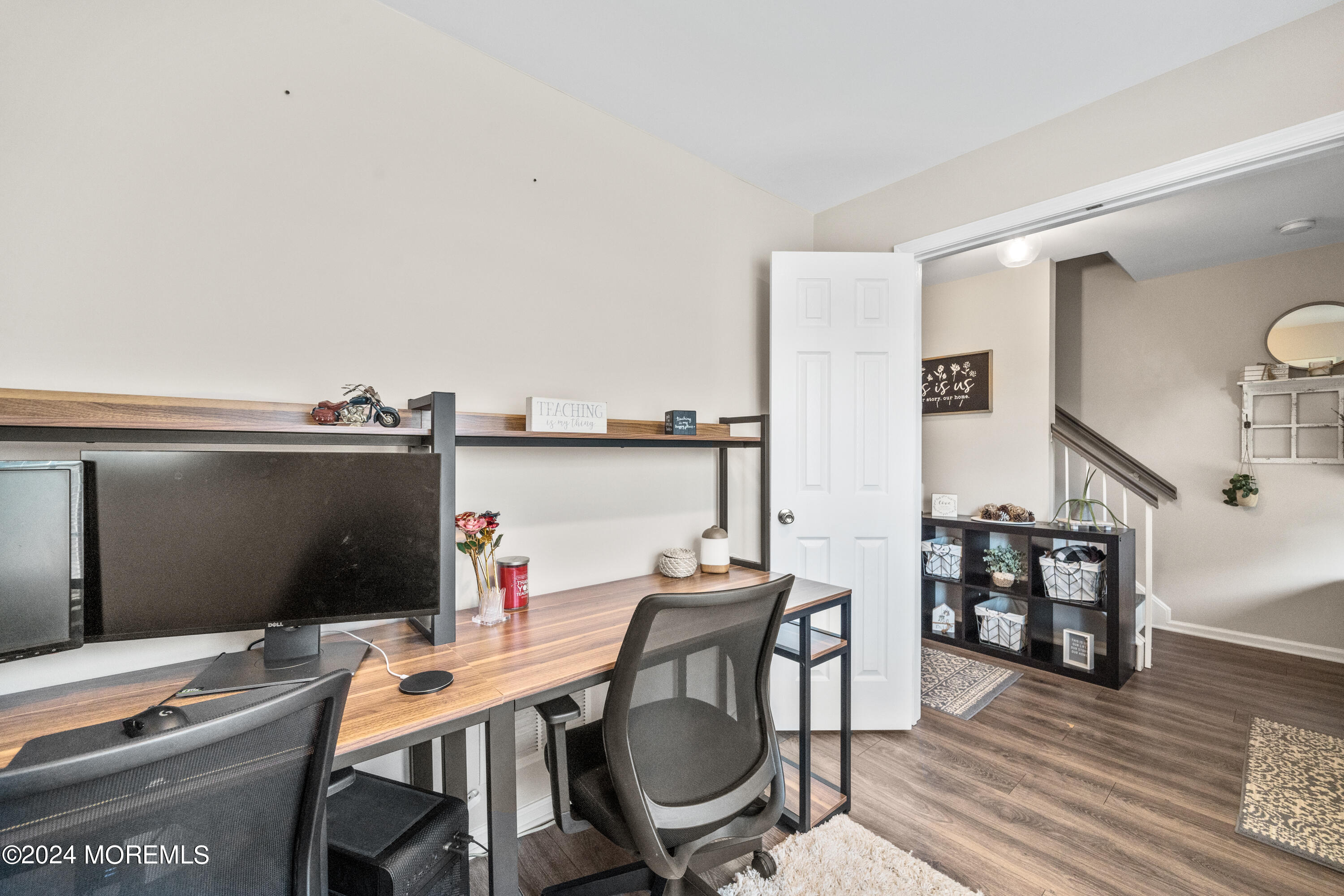 5 Kuczynski Drive, Unit 945 Parlin, NJ 08859 - Photo 9 of 62 a view of a workspace with furniture and wooden floor