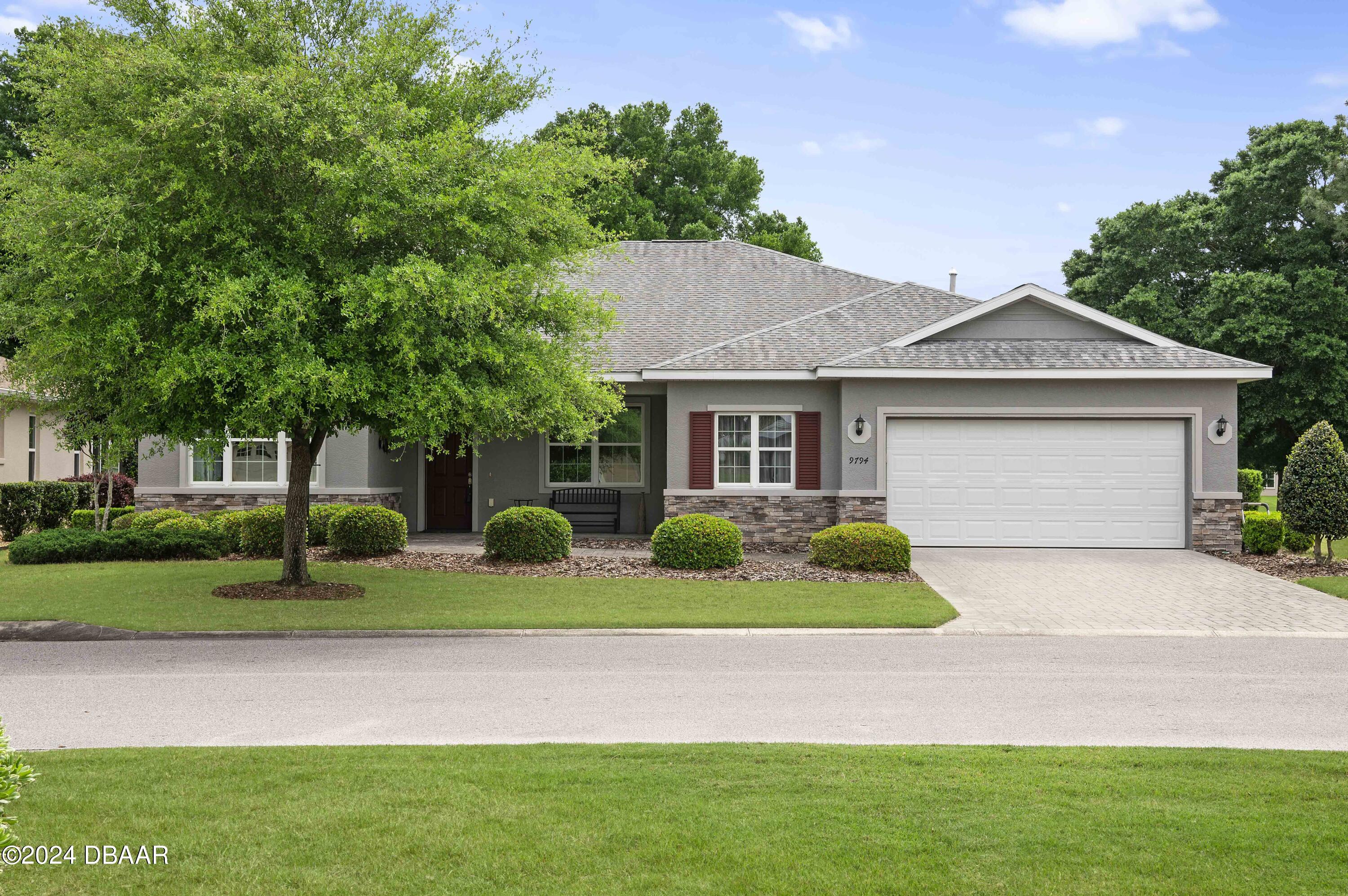 9794 Southwest 92 Street Ocala, FL 34481 - Photo 39 of 39 a front view of house with yard and green space