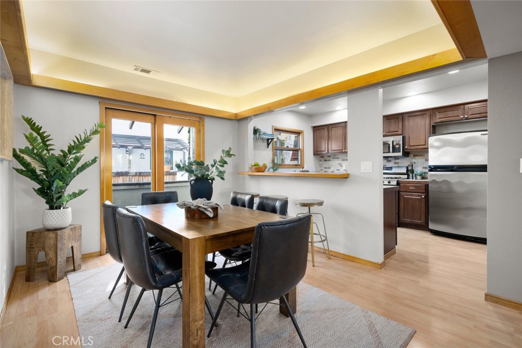 670 Chorro Street, Unit D San Luis Obispo, CA 93401 - Photo 15 of 40 a kitchen with a table and chairs in it