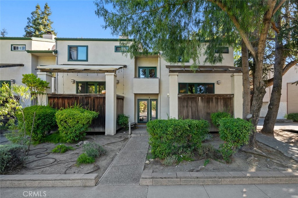 670 Chorro Street, Unit D San Luis Obispo, CA 93401 - Photo 2 of 40 a front view of a house with garden