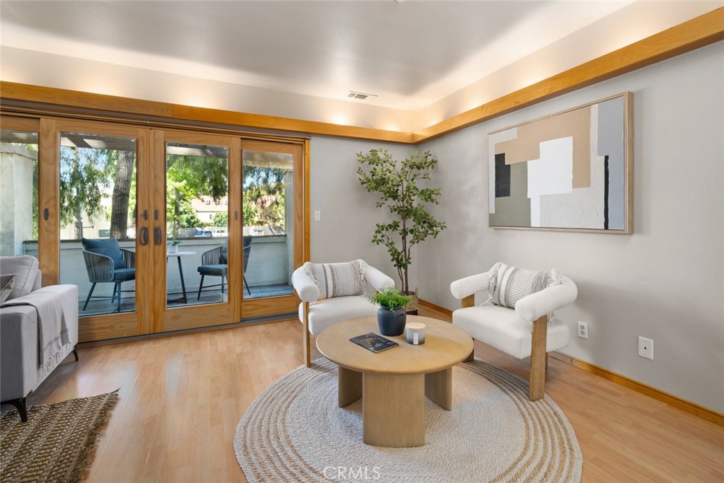670 Chorro Street, Unit D San Luis Obispo, CA 93401 - Photo 8 of 40 a living room with furniture and a large window
