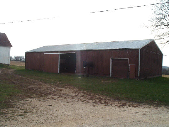 15568 Yale Bridge Road Durand, IL 61024 - Photo 5 of 5 a backyard of a house