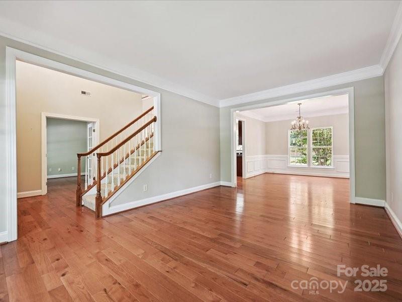 6932 Augustine Way Charlotte, NC 28270 - Photo 12 of 46 a view of an entryway with wooden floor