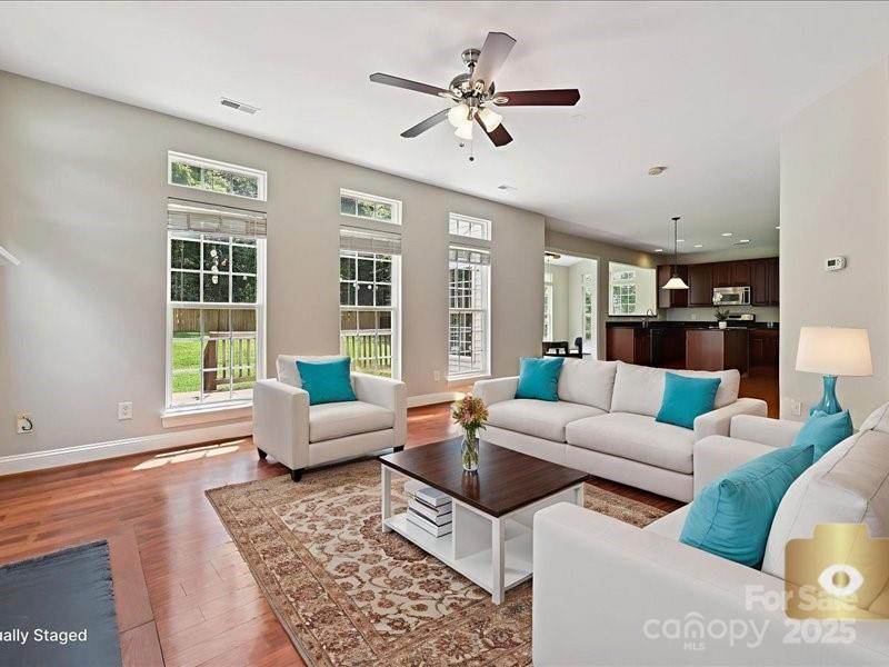 6932 Augustine Way Charlotte, NC 28270 - Photo 20 of 46 a living room with furniture and a large window