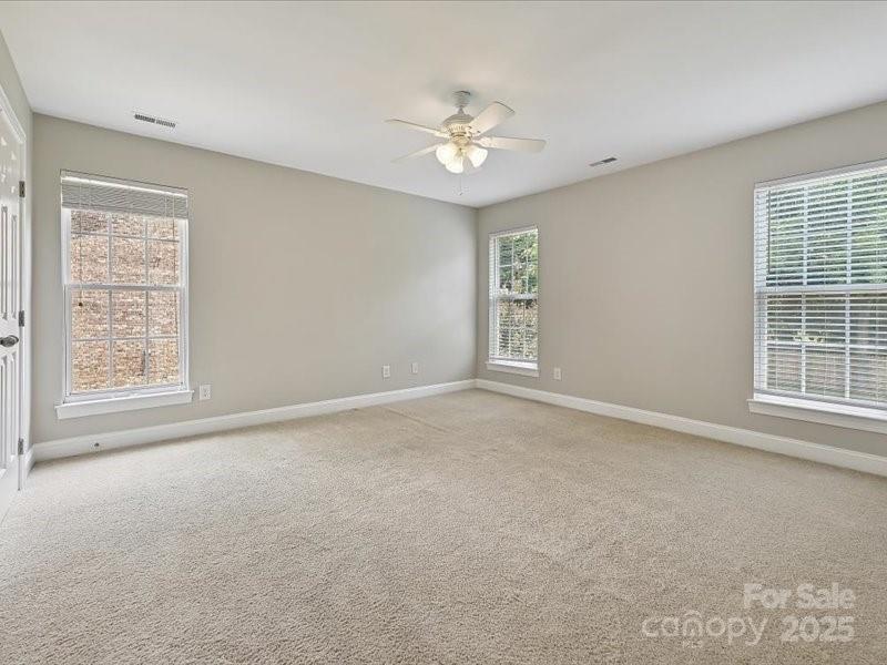 6932 Augustine Way Charlotte, NC 28270 - Photo 39 of 46 a view of an empty room with a window