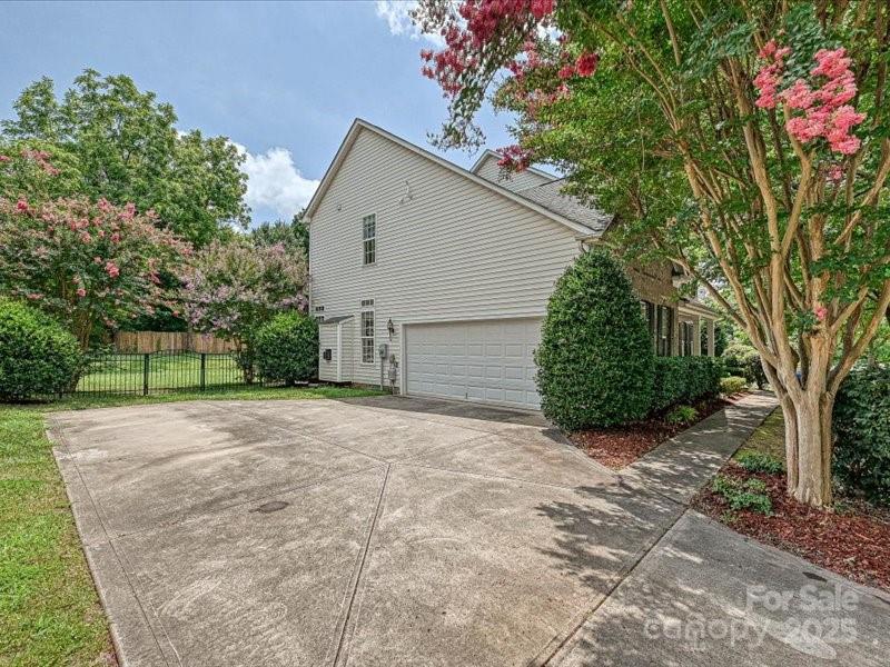 6932 Augustine Way Charlotte, NC 28270 - Photo 44 of 46 a view of a house with a street