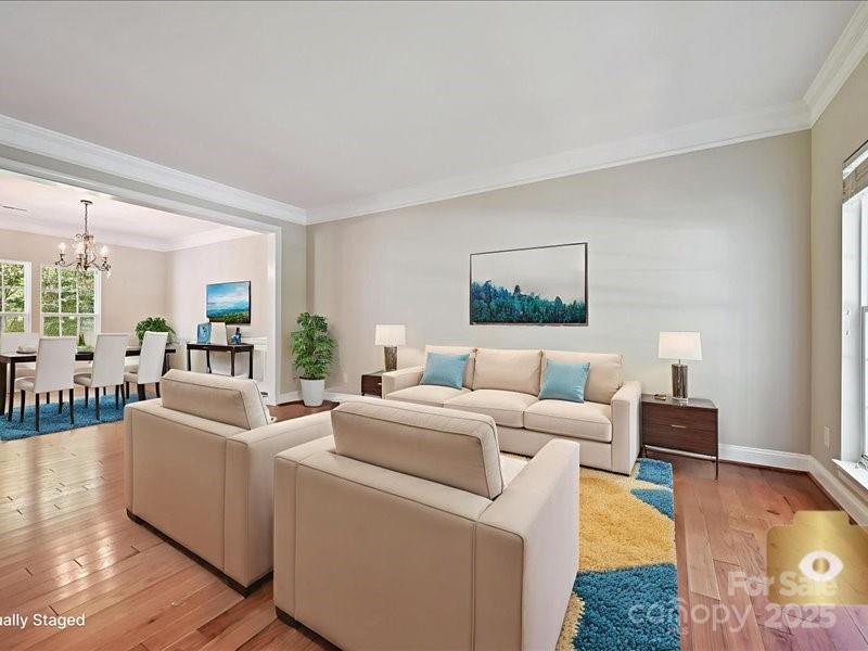 6932 Augustine Way Charlotte, NC 28270 - Photo 7 of 46 a living room with furniture and a large window