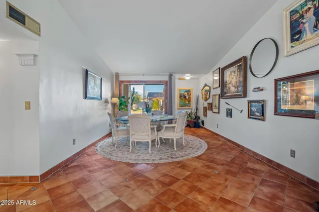 a view of a entryway with furniture and floor to ceiling window