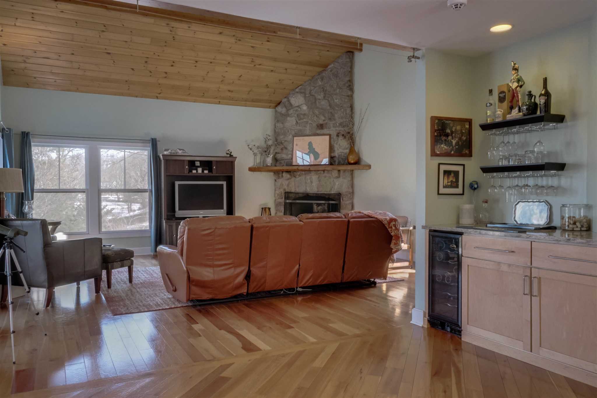 209 Lake Road Pine Plains, NY 12567 - Photo 15 of 34 a living room with furniture and a fireplace