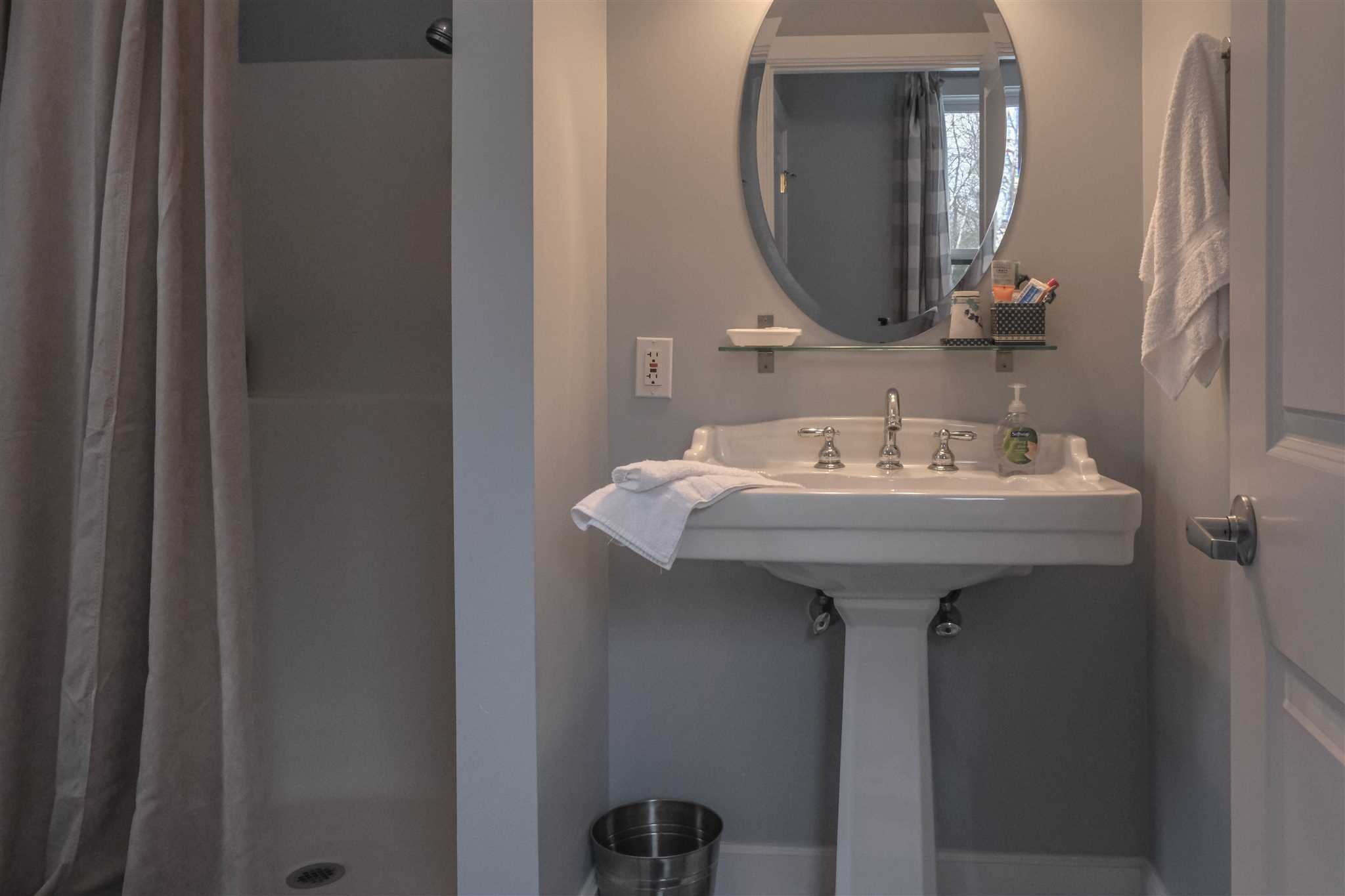 209 Lake Road Pine Plains, NY 12567 - Photo 24 of 34 a bathroom with a sink and a mirror