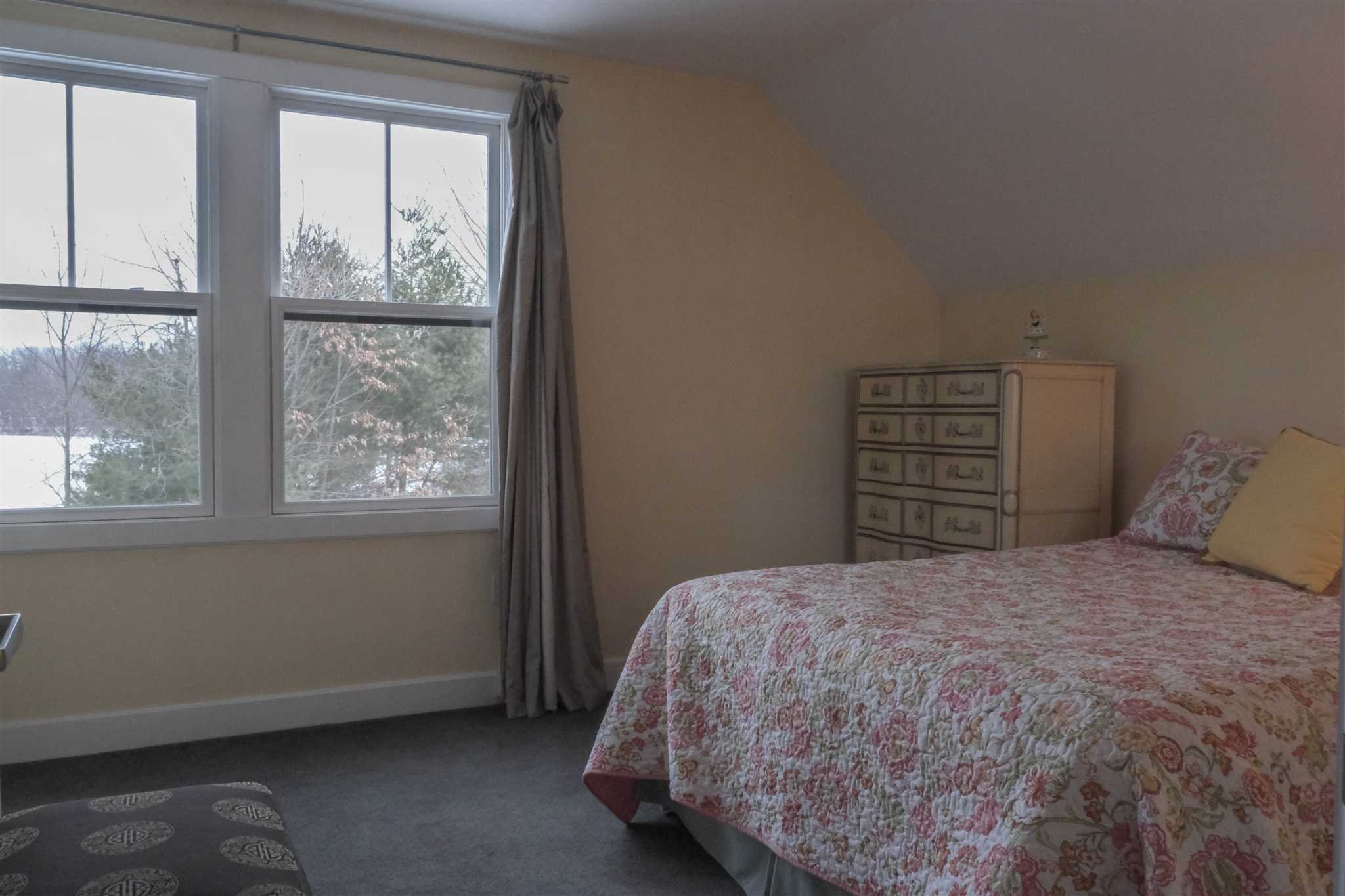 209 Lake Road Pine Plains, NY 12567 - Photo 26 of 34 a bedroom with a bed and a window