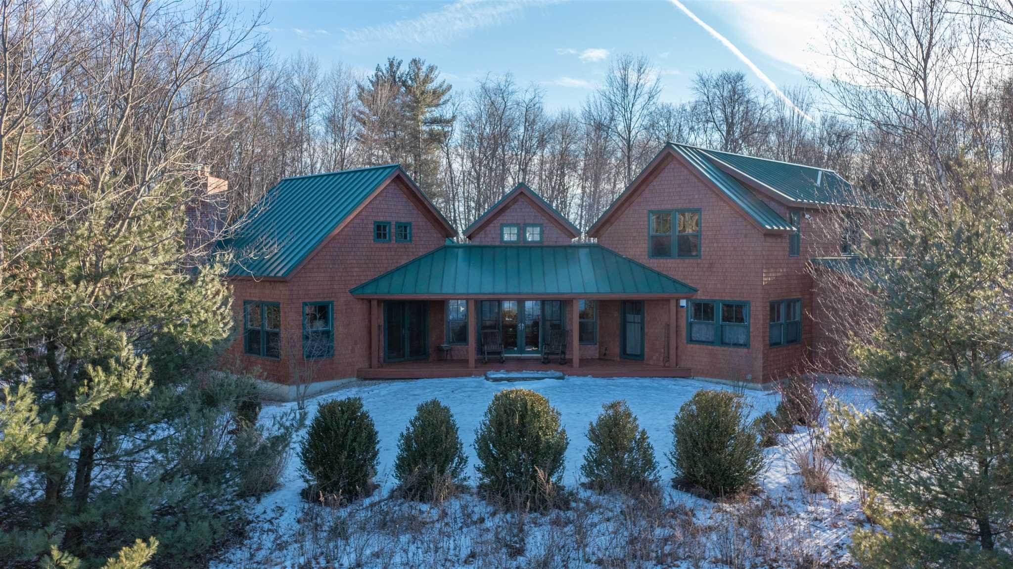 209 Lake Road Pine Plains, NY 12567 - Photo 3 of 34 a front view of a house with garden