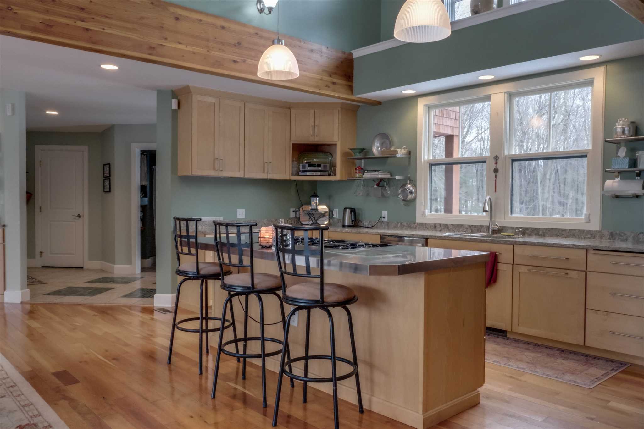 209 Lake Road Pine Plains, NY 12567 - Photo 8 of 34 a kitchen with granite countertop a stove a sink and a refrigerator