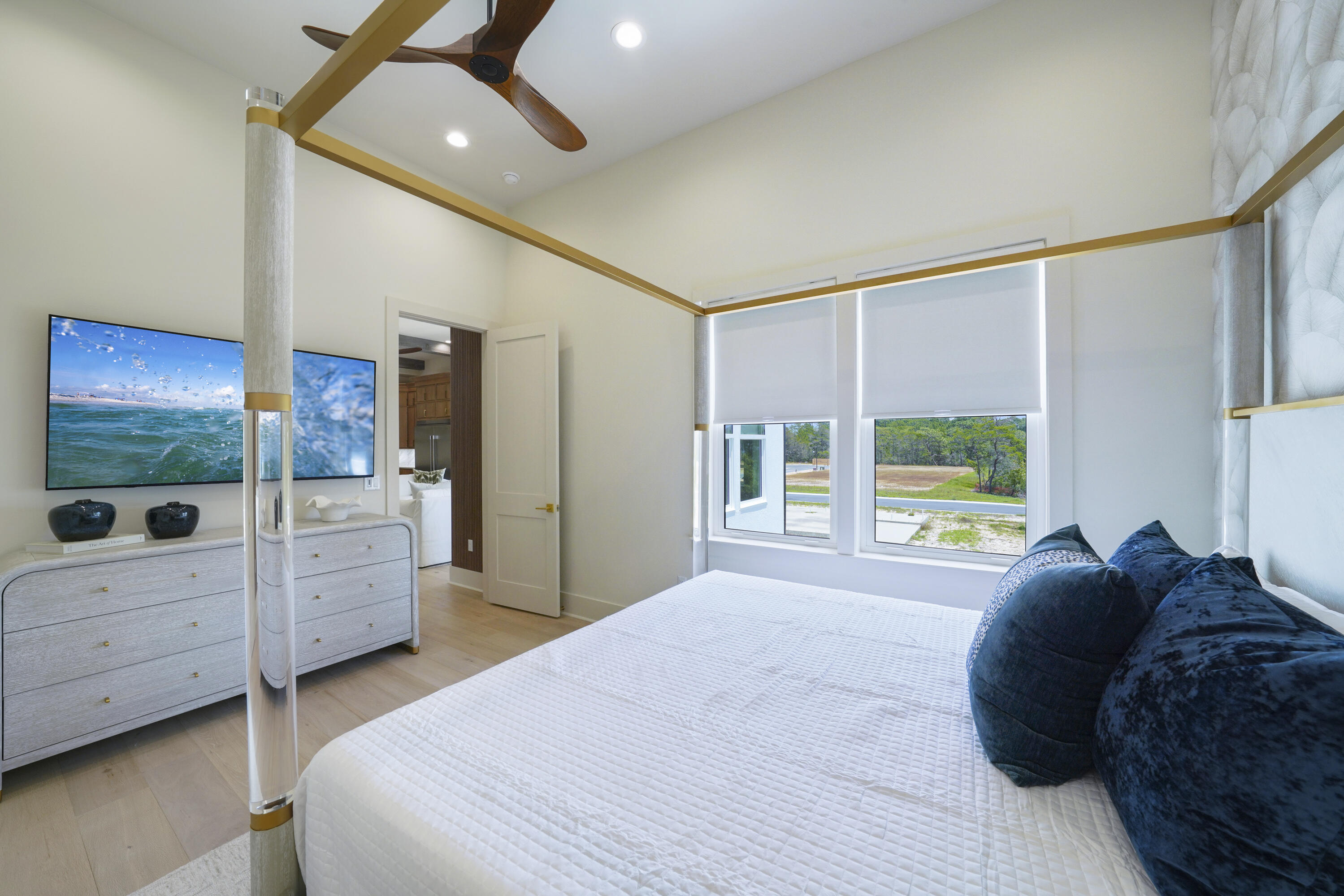 56 Sea Croft Cove Santa Rosa Beach, FL 32459 - Photo 37 of 65 a bedroom with a bed dresser and a window