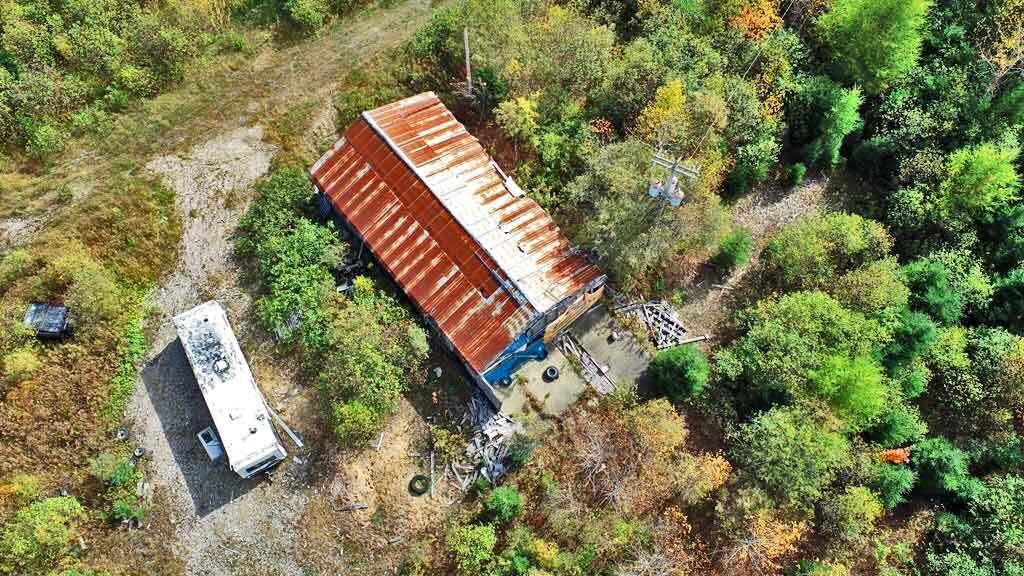 1961 Ludlow Road Ludlow, ME 04730 - Photo 23 of 33 old-lumber-mill-aerial