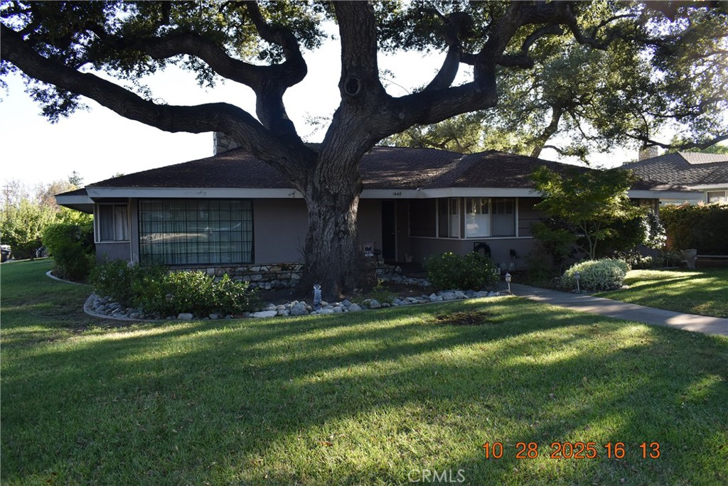 1640 Oak Tree Lane Glendora, CA 91741 - Photo 2 of 2 a view of a house with a yard and a large tree