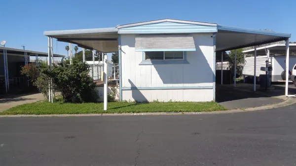 a front view of house with yard