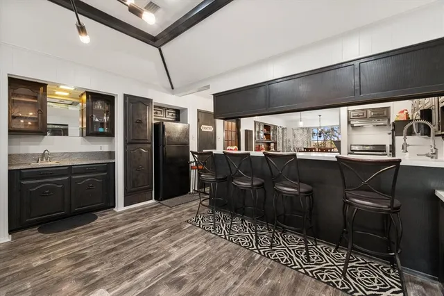a kitchen with granite countertop lots of counter top space