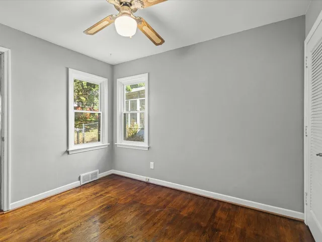 a bathroom with a sink a mirror toilet and bathtub