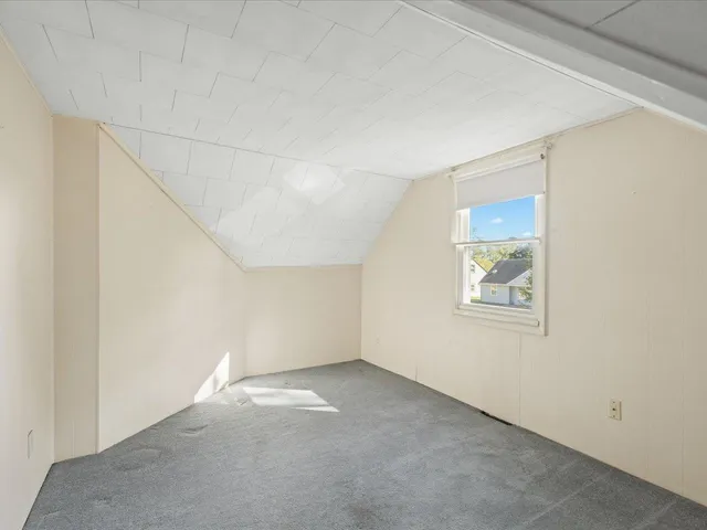 a view of a two chairs with wooden floor