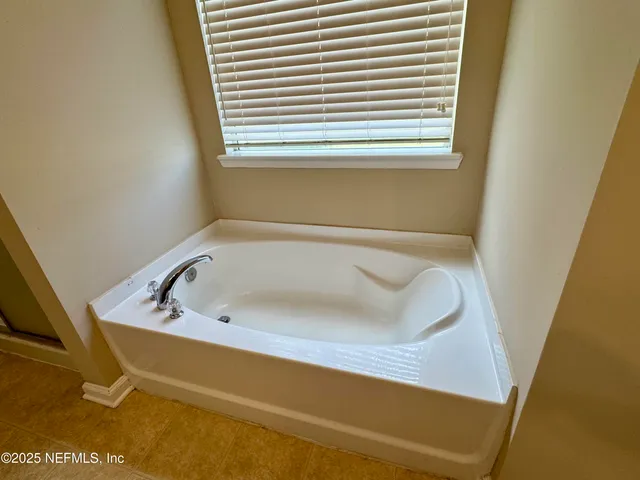 a bathroom with a bathtub