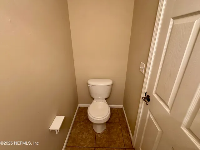 a bathroom with a toilet and a sink