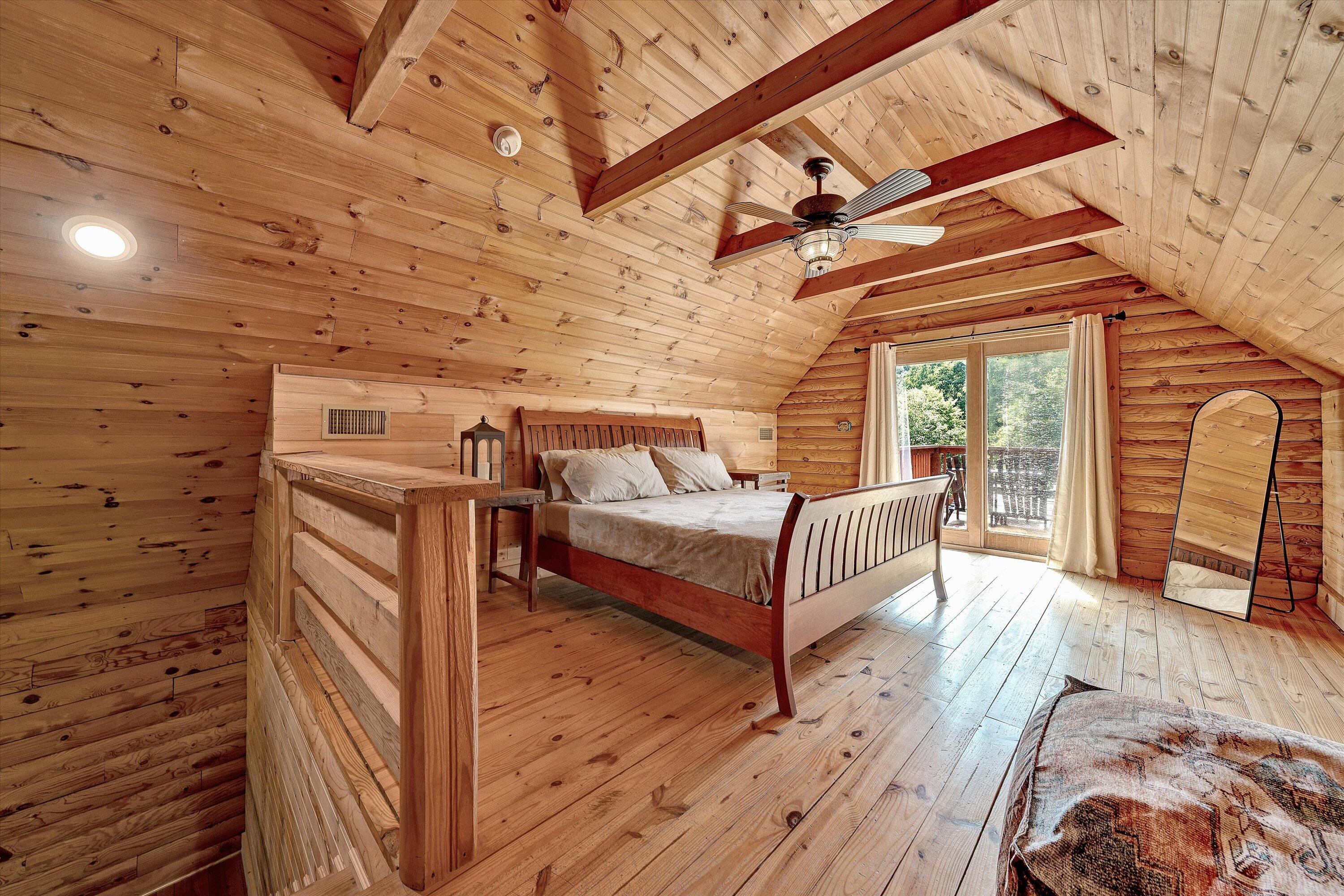 6211 Hillcrest Road Salem, VA 24153 - Photo 17 of 36 a bedroom with a bed and wooden floor