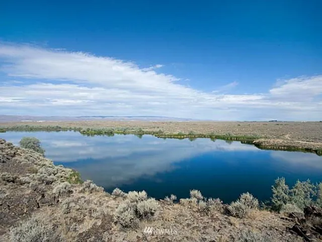 a view of lake with mountain