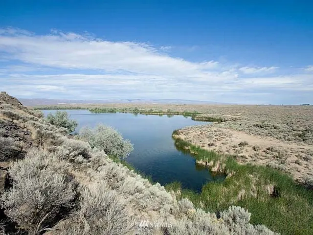 a view of lake with ocean view