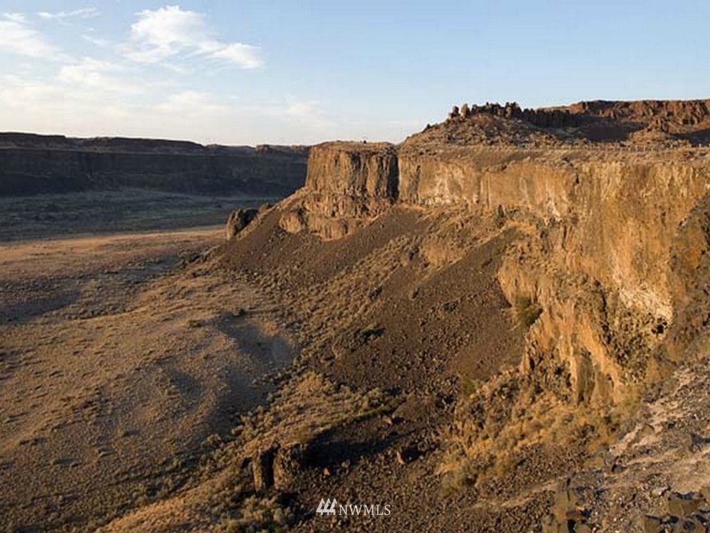 0 Silica Road Southwest Quincy, WA 98848 - Photo 6 of 24 a view of a large body of water with a mountain in the background
