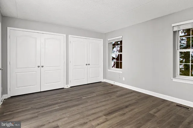 a view of a hallway with staircase