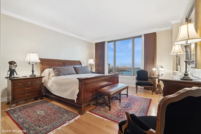 a bathroom with a granite countertop sink mirror and double