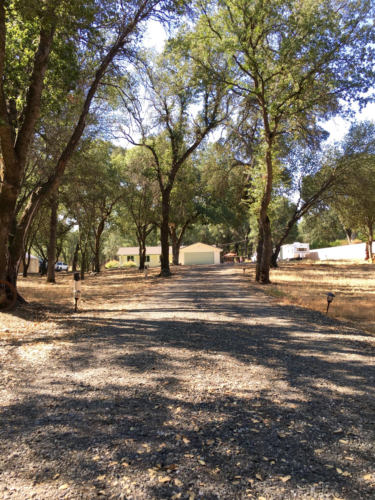17215 Bowman Road Cottonwood, CA 96022 - Photo 4 of 30 Private gated driveway