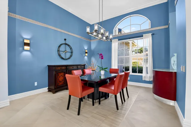a kitchen with stainless steel appliances kitchen island granite countertop a stove and cabinets
