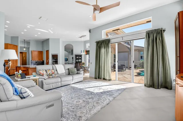 a bedroom with a bed and flat screen tv