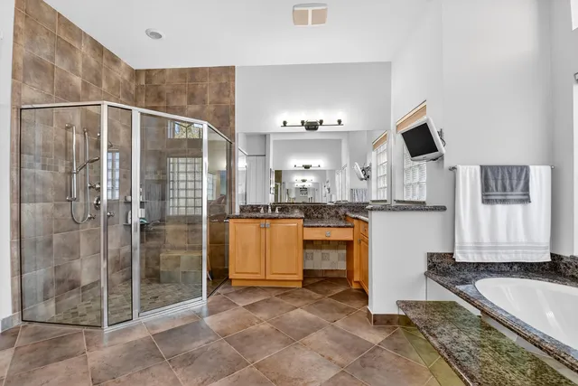 a view of a backyard and palm tree