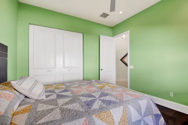 a view of a swimming pool with outdoor seating