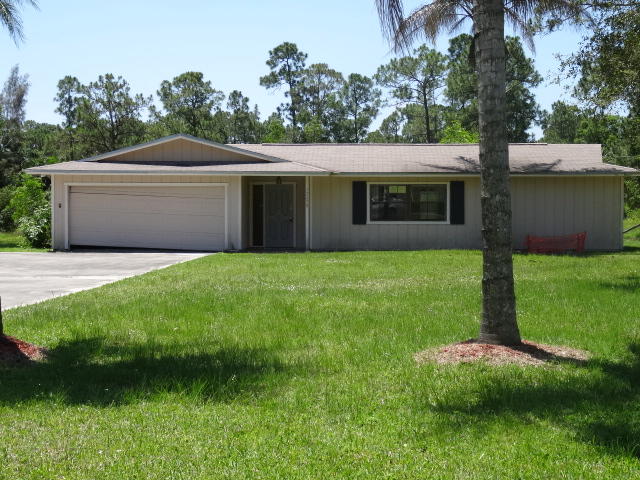 12670 170th Road North Jupiter, FL 33478 - Photo 1 of 13 Front exterior