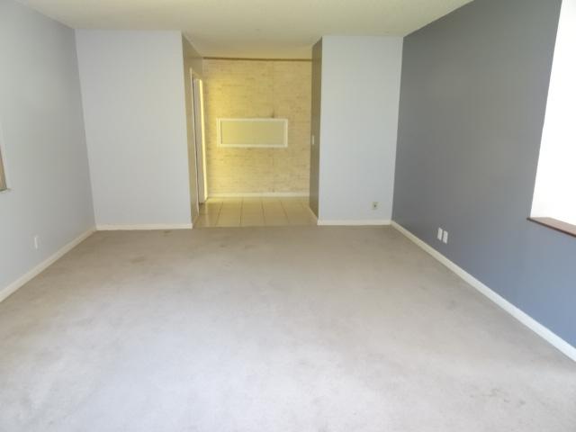 12670 170th Road North Jupiter, FL 33478 - Photo 3 of 13 Living room, alternate angle