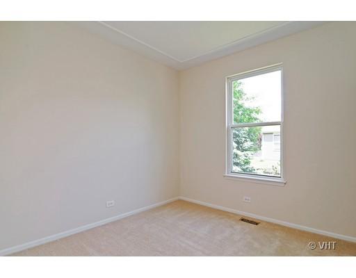 293 Shagbark Court Round Lake, IL 60073 - Photo 9 of 10 an empty room with a window
