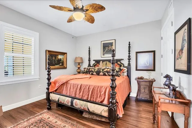 a bedroom with furniture and a window