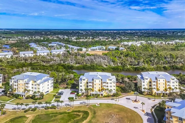 a view of a city with a lake