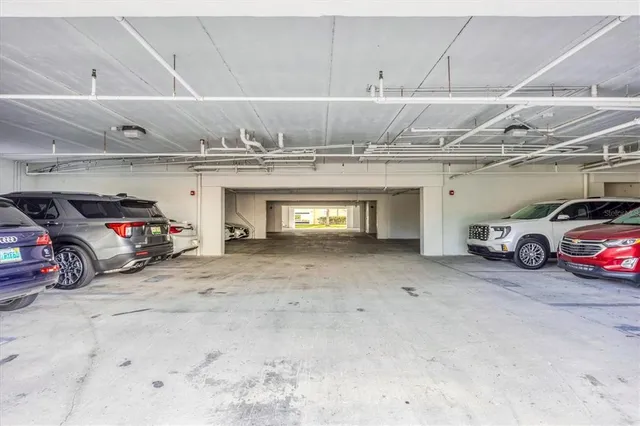 a view of a swimming pool and chairs