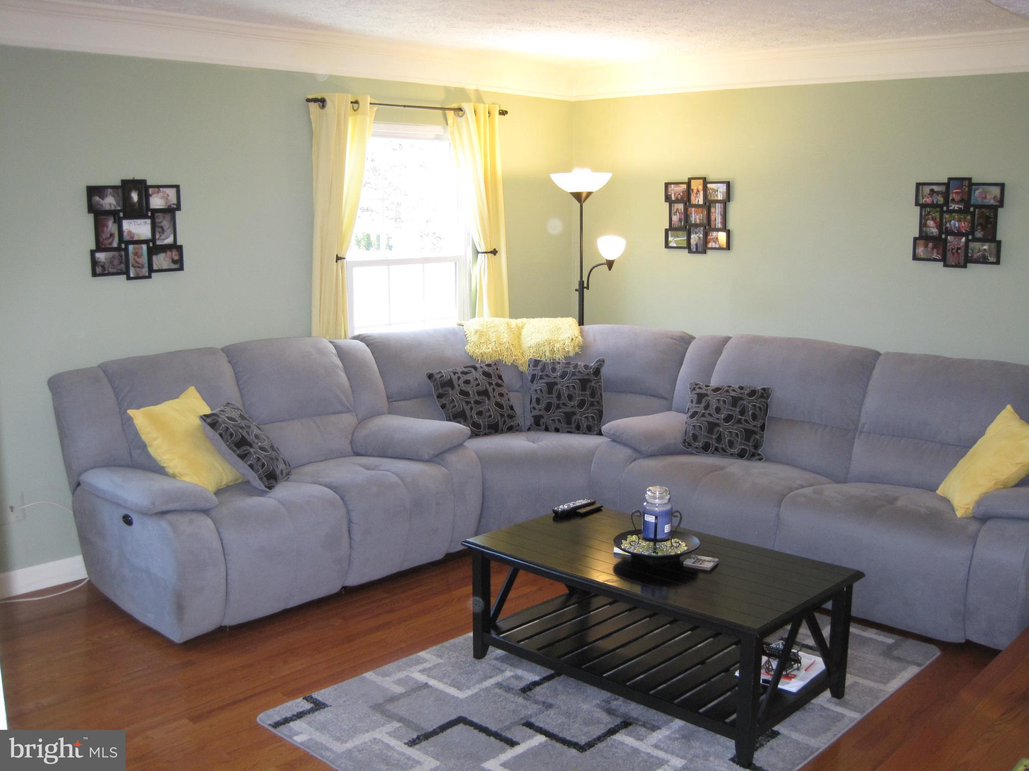 6178 Morning Glory Road Alexandria, VA 22310 - Photo 10 of 26 a living room with furniture and a large window