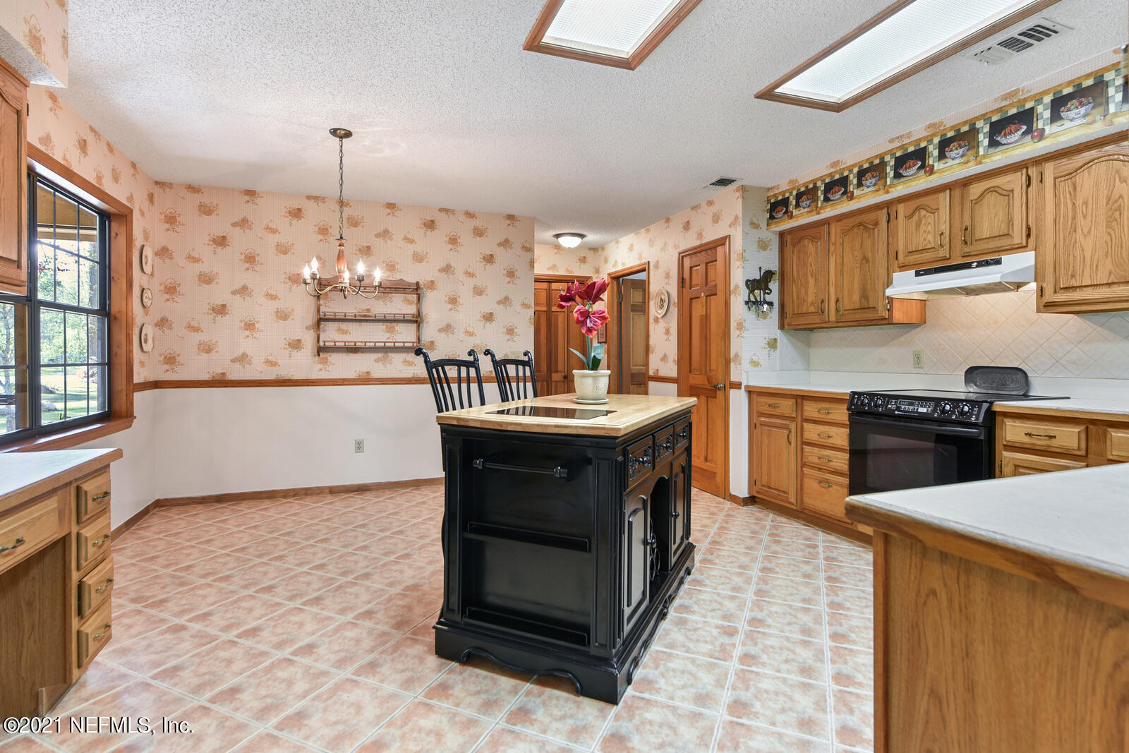 8915 Alligators Road Jacksonville, FL 32219 - Photo 15 of 36 Kitchen - Island