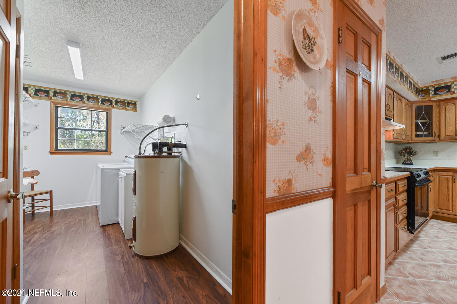 8915 Alligators Road Jacksonville, FL 32219 - Photo 19 of 36 Large Laundry Room