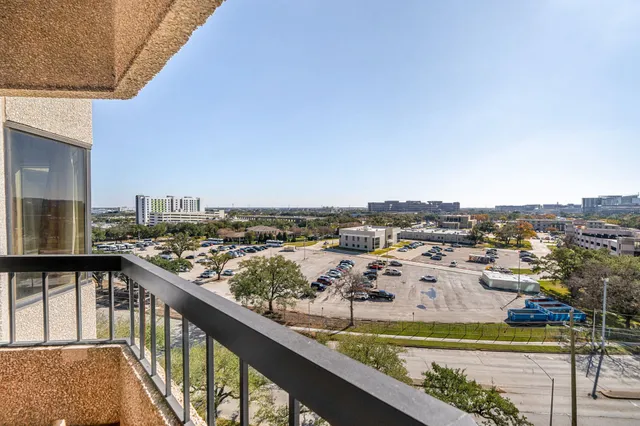 a view of a city from a balcony
