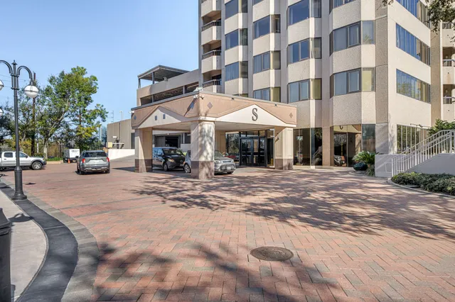 a view of a building with a street